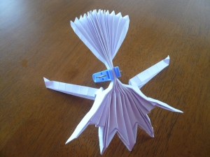 Allocating paper to the wings,  arms and head